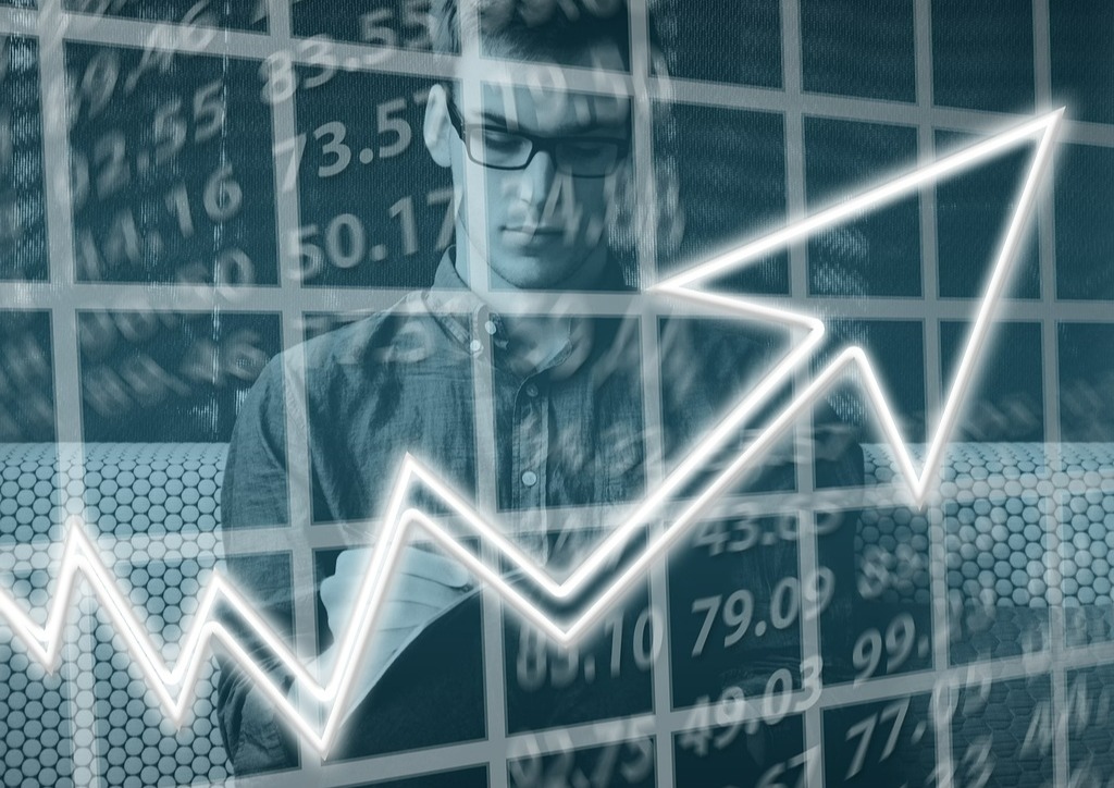 Gruppe vor einem Chart